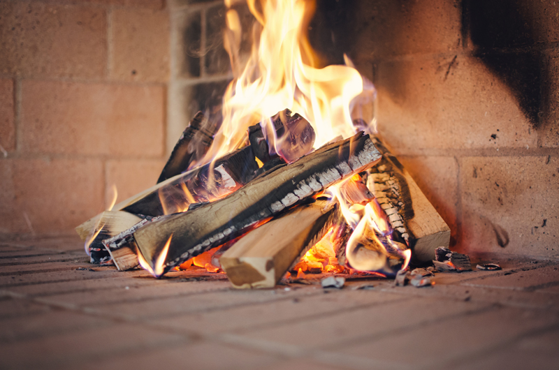 Logs burning in the brick fireplace at Samedru's restaurant